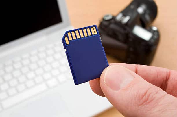Sd card, camera, and laptop