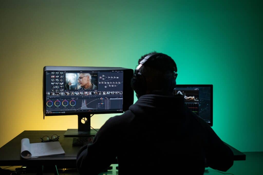 A person doing Video Editing of DSLR Video
